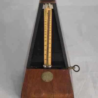The metronome without the front cover piece.