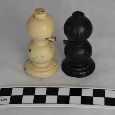 Back and size comparison of lamp salt and pepper shakers.