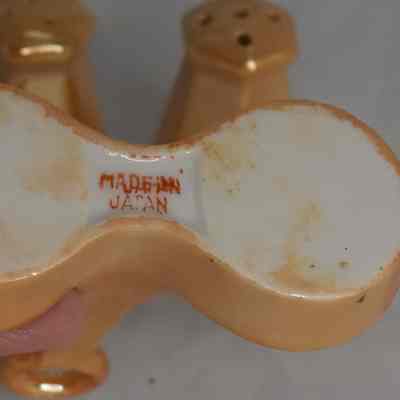 Inscription on bottom of holder "Made in Japan".