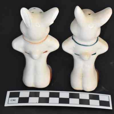 Back and size comparison of rabbit salt and pepper shakers.