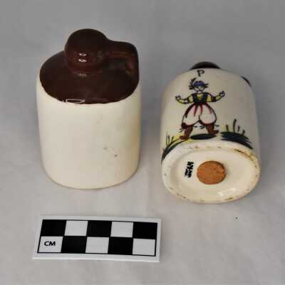 Un decorated back and bases with cork stoppers and "Japan" label
