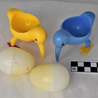 Yellow kiwi- 2022.1.142a, Blue kiwi- 2022.1.142b, Egg- 2022.1.142c, and Egg- 2022.1.142d