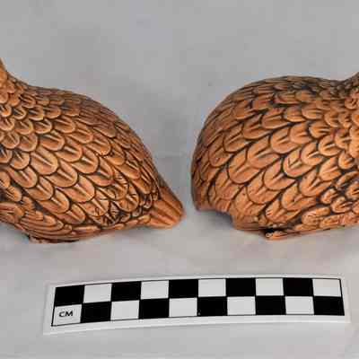 Back and size comparison of Quail salt and pepper shakers.