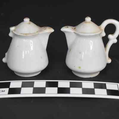 Back and size comparison of the teapot salt and pepper shakers.