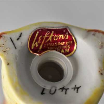 Red and gold Lefton's label
