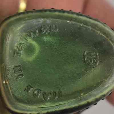 Embossed on bottom of each shaker "Made in Taiwan".