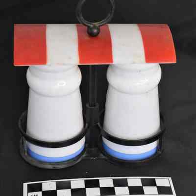 Back and size comparison of chef salt and pepper set.
