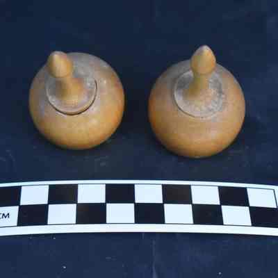 Back and size comparison of the maraca salt and pepper shakers.