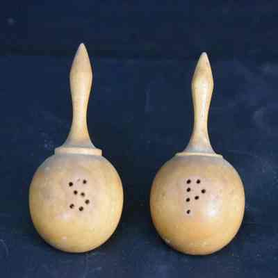 Vintage wooden maraca salt and pepper shakers.
