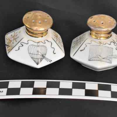 Other side and size comparison for hexagon shaped salt and pepper shakers.