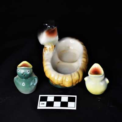 Nest- 2022.1.206a, Saltshaker- 2022.1.206b, and Pepper shaker- 2022.1.206c