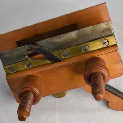 Side of screw arm plow plane.