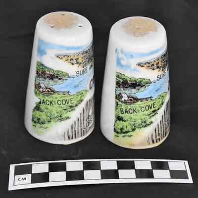 Other side and size comparison of Maine salt and pepper shakers.