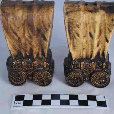Back and size comparison of the wagon salt and pepper shakers.