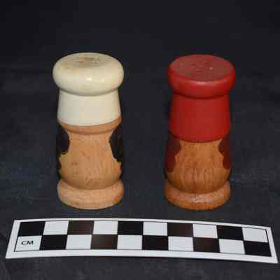 Back and size comparison of the chef salt and pepper shakers.