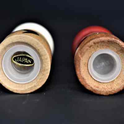 Original Japan label on the bottom of the salt shaker and an original inscription marked "Japan" on the bottom of the pepper shaker.