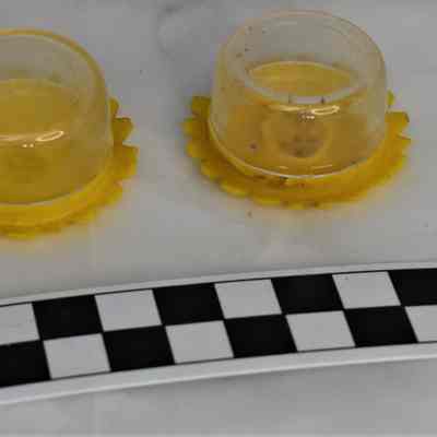 Bottom and size comparison of flower salt and pepper shakers.