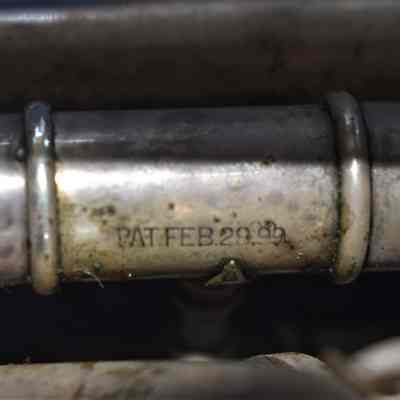 The "PAT.FEB.28.99" inscription on the main tuning slide.