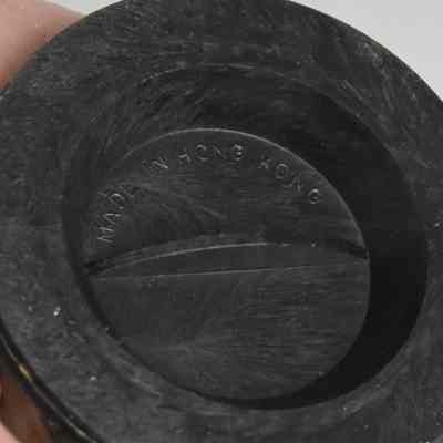 Bottom of each marked "Made in Hong Kong".