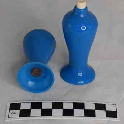 Size comparison for Carvanite salt and pepper shakers.