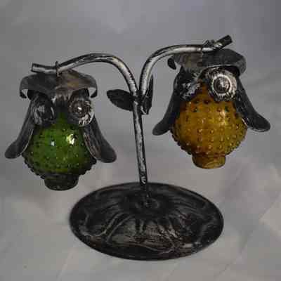 Vintage glass owls with a metal stand salt and pepper shakers.