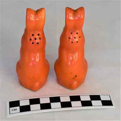 Back and size comparison of rabbit salt and pepper shakers.