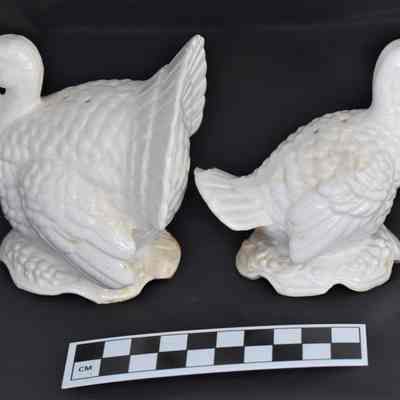Other side and size comparison of turkey salt and pepper shakers.