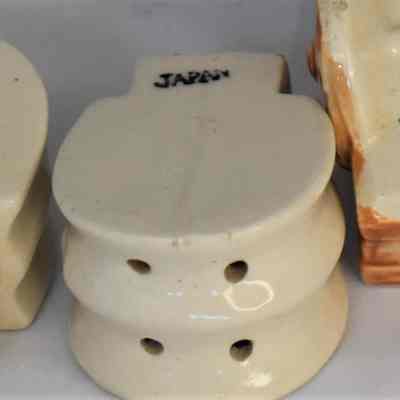 Marks on bottom of cart and sides of shakers - Japan.