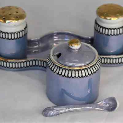Blue and gold Lusterware condiment set.