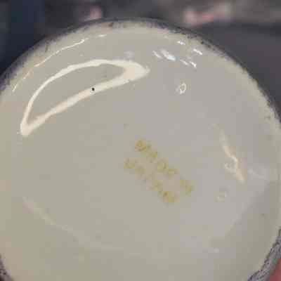 Marked "Made in Japan" on the bottom of shakers, mustard, and tray.