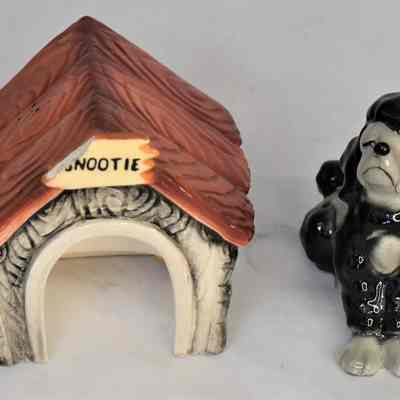 "Snootie" signe has chip on upper left corner.