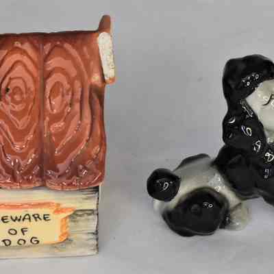 Side of doghouse reads "Beware of Dog".