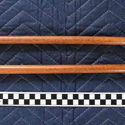 Closer view of the drumsticks and size comparison.