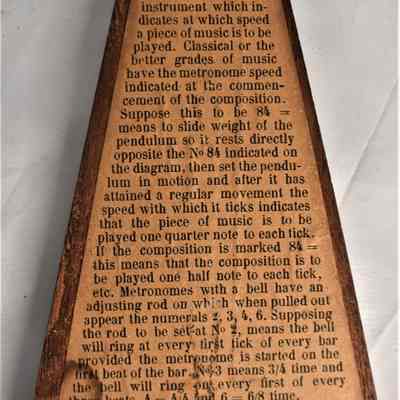 The inside of the front cover piece includes a description of metronomes and how they work.