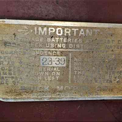 This plate is located just behind the engine.