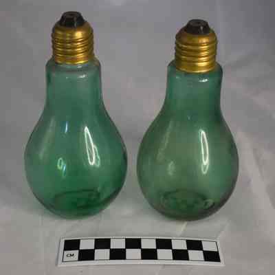 Back and size comparison of the lightbulb salt and pepper shakers.