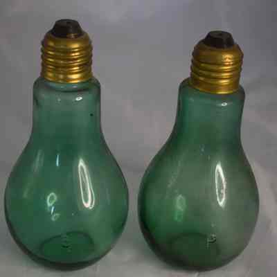Vintage green glass lightbulb salt and pepper shakers. Made in Taiwan.