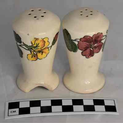 Other side and size comparison of floral shakers.