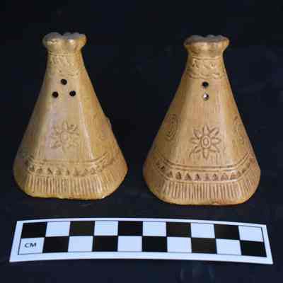 Back and size comparison of the teepee salt and pepper shakers.