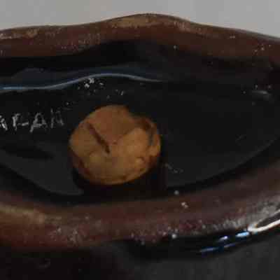 Marked "Japan" on bottom of smaller shaker.