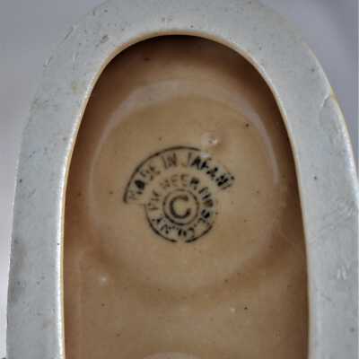 Maker's mark on underside of dish