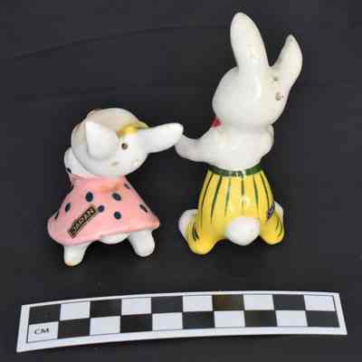 Back and size comparison of rabbit salt and pepper shakers.