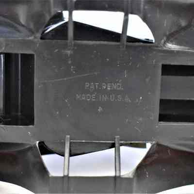 Bottom of the car that has an original inscription that says "Pat. Pend. Made in U.S.A.