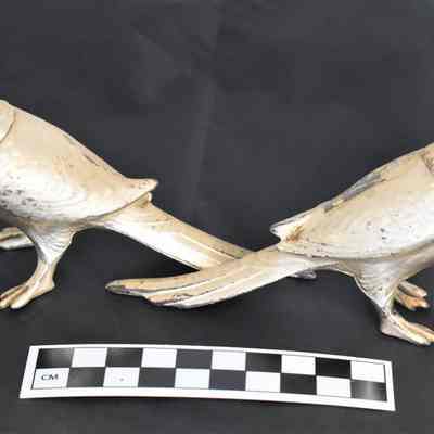 Other side and size comparison of pheasant salt and pepper shakers.