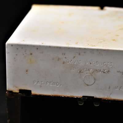 Base with manufacturer label