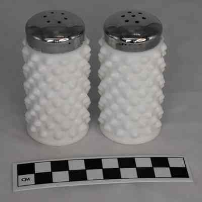 Back and size comparison of hobnail salt and pepper shakers.