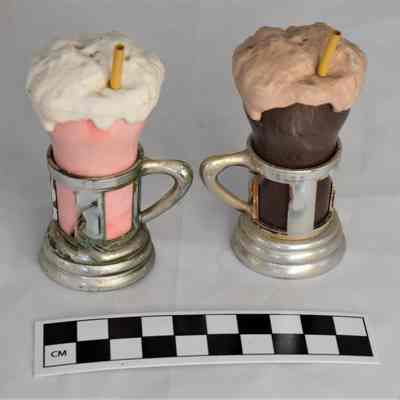 Other side and size comparison of ice cream soda shakers.