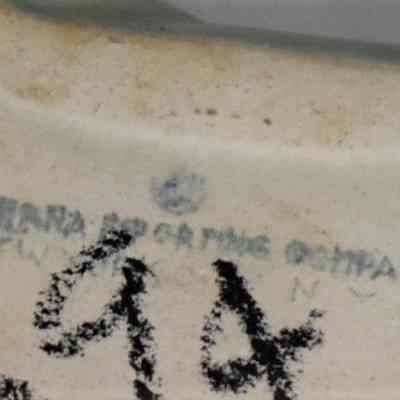 Marked "Mahana Importing Company New York City, N.Y." on bottom of each shaker.