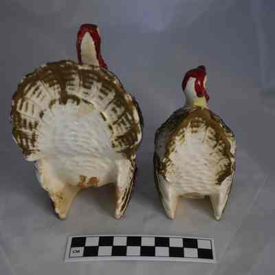 Back and size comparison of the turkey salt and pepper shakers.