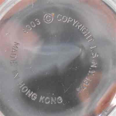 Embossed on the bottom of each shaker: Made in Hong Kong 8303 Copyright J.S.N.Y. 1974.